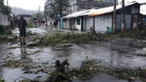 Toppled trees can be seen in the streets of downtown Legazpi City in Albay. Rey Montimor, World Vision staff who took the photos, is more worried of the condition of families in the evacuation centers and their homes which they left for safety.