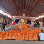 World Vision assists Odette-affected Negros Occidental town with food packs
